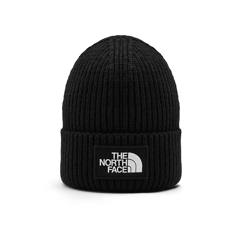 black north face bobble hat